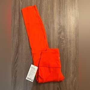 New with tags Lululemon Align high rise pant with pockets 28”Solar Orange.Size 6